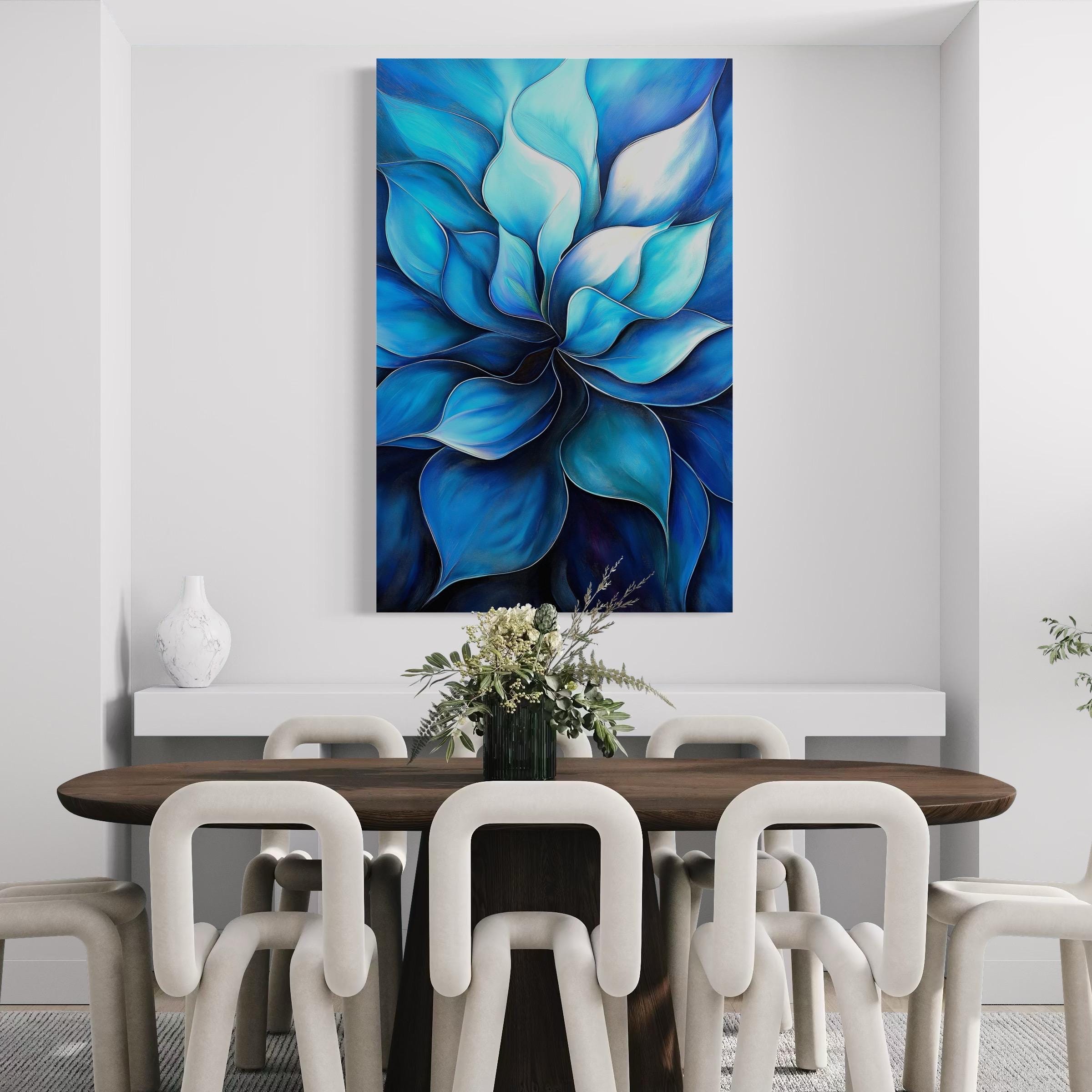 Room mockup showing a portrait abstract blue floral artwork above a table with plants