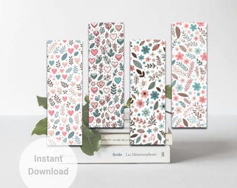 May include: Three printable bookmark designs featuring floral patterns with pink, blue, and green colors. The designs include hearts, flowers, and leaves.
