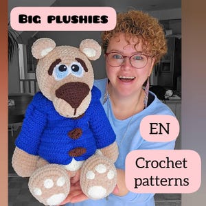 May include: A woman holds a large crocheted plush bear wearing a blue jacket. The bear has brown eyes and a brown nose. The text "BIG PLUSHIES" is at the top of the image and "EN Crochet patterns" is at the bottom of the image.