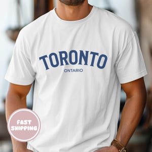 Camiseta de Toronto, Ontario, recuerdo de Toronto, Canadá, unisex, azul, con el nombre de la ciudad, regalo urbano para turistas y aficionados de Toronto.
