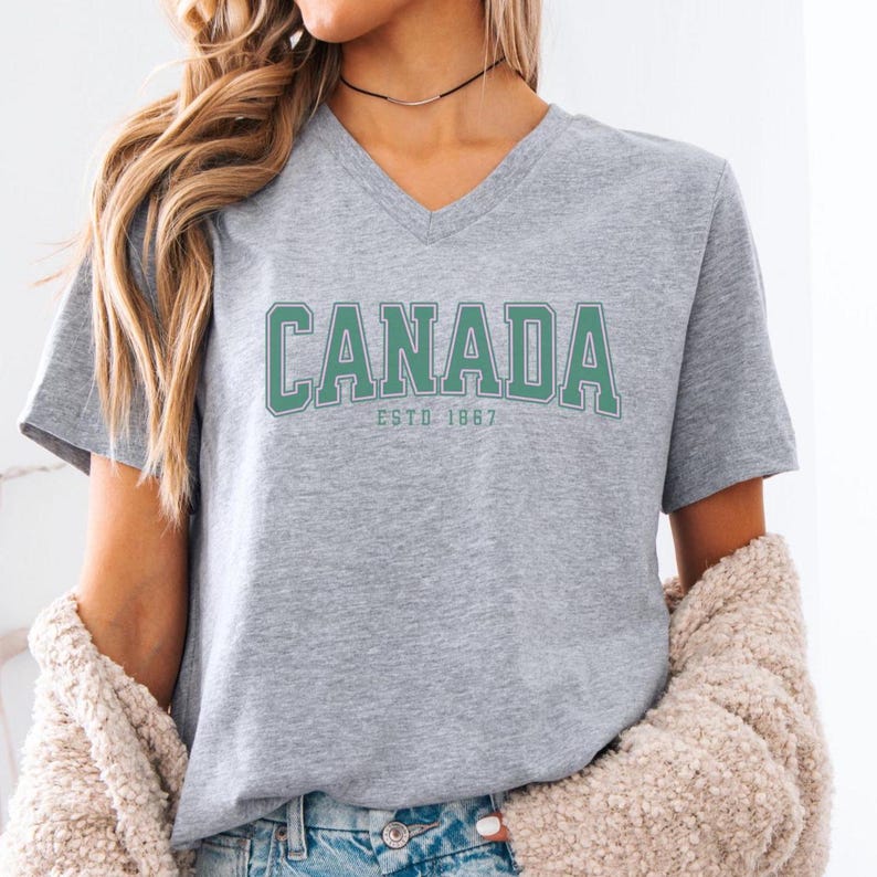 Canada Women's V-Neck Tee, Patriotic Graphic Tee, Canadian Pride Shirt, Vintage Canada T-Shirt, Canadian Travel Attire, Tourist Souvenir