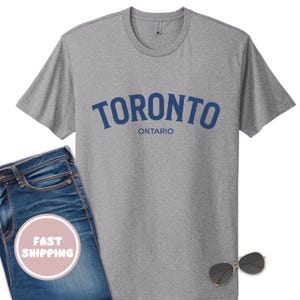 Toronto Ontario T Shirt, Toronto Canada Souvenir Tee, Unisex Next Level Blue City Name Shirt, Urban Gift for Tourists and Toronto Fans
