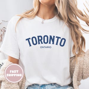 Camiseta de Toronto, Ontario, recuerdo de Toronto, Canadá, unisex, azul, con el nombre de la ciudad, regalo urbano para turistas y aficionados de Toronto.