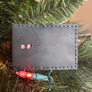 Cartera de identificación con forma de ladrón navideño