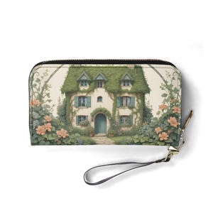 Kleines Cottage mit Efeu und blühenden Blumen
