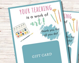May include: A blue and white gift card with the text "YOUR TEACHING is a work of art!" and "thank you for all you do!"  The card also features a watercolor palette and paintbrushes.  The text "GIFT CARD" is at the bottom of the card.