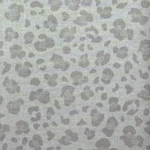 May include: A woven fabric featuring a repeating leopard print pattern in shades of light gray and white. The material displays a visible cross-hatched texture throughout, with the animal spots rendered in a soft, muted gray tone against a white base.