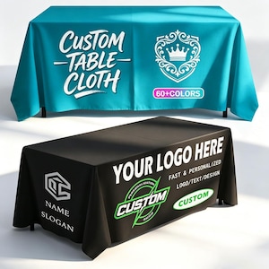 May include: A turquoise rectangular tablecloth featuring the white text CUSTOM TABLE CLOTH and a crown emblem, alongside a black rectangular tablecloth displaying the white text YOUR LOGO HERE, FAST & PERSONALIZED, LOGO/TEXT/DESIGN, CUSTOM, and NAME SLOGAN.