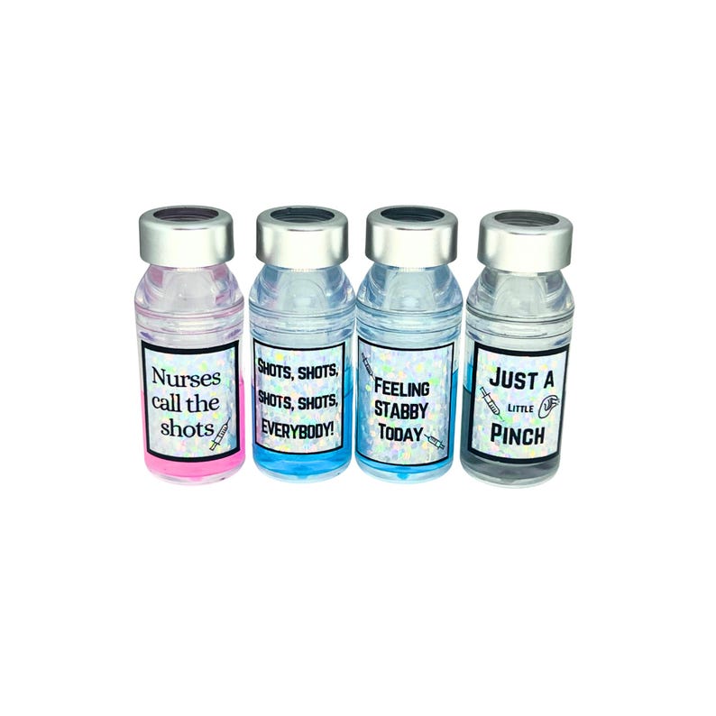 four different liquid vial caps. pink liquid vial cap says nurses call the shots, blue liquid vial cap says shots shots shots shots everybody, blue liquid vial cap says feeling stabby today, gray liquid  vial cap says just a little pinch