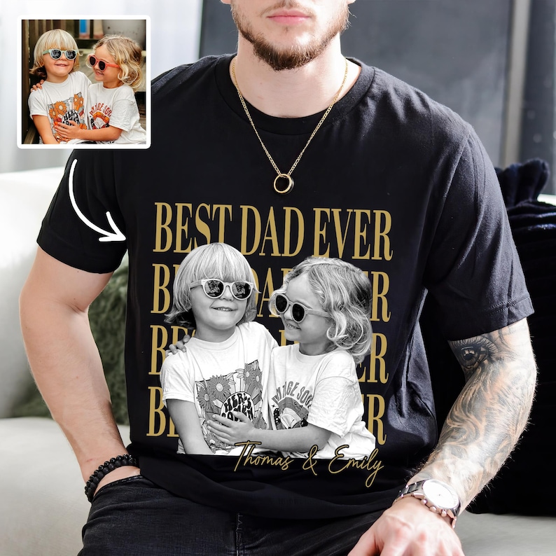 May include: Black t-shirt with a gold "BEST DAD EVER" design and a black and white photo of two children wearing sunglasses. The children's names, "Thomas & Emily," are printed below the photo.
