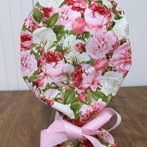 Roses with a pink trim ponytail surgical/scrub cap.