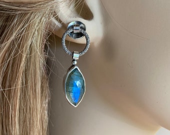 Sparkling blue flash Labradorite gemstone hanging from a woven textured Sterling Silver hoop, post style, dangle earrings.