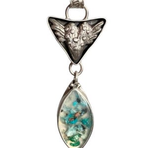 Flying Heart and Chrysocolla pendant. Sterling and Fine Silver flying heart with marquis shaped Chrysocolla and native Copper in Chalcedony.