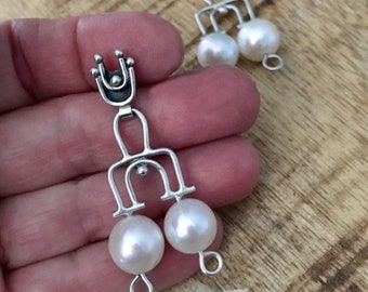 Handcrafted sterling silver wire dangle “angel arches” post earrings. Old World design with plump, lusterous white Pearls. Ancient looking…