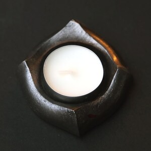 Forged candle holder