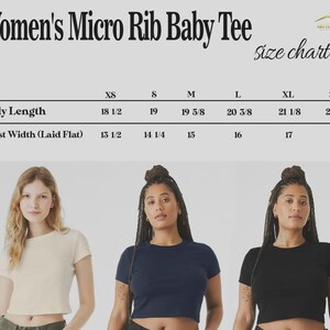 May include: A size chart for a Women's Micro Rib Baby Tee is displayed, with measurements in inches. The image features three women wearing the tee in cream, navy, and black. The body length ranges from 47 cm to 55 cm.