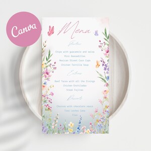 May include: A menu card with a floral design and the word "Menu" in cursive. The menu includes starters, entrees, and desserts. The menu is surrounded by watercolor flowers and butterflies. The word "Canva" is in a pink circle in the upper left corner.