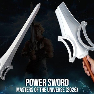 May include: A silver-colored Power Sword from Masters of the Universe (2026) featuring a long, pointed blade, a curved crossguard, and a brown handle with a silver pommel. The sword is displayed in two views, one full length and one held by a hand.