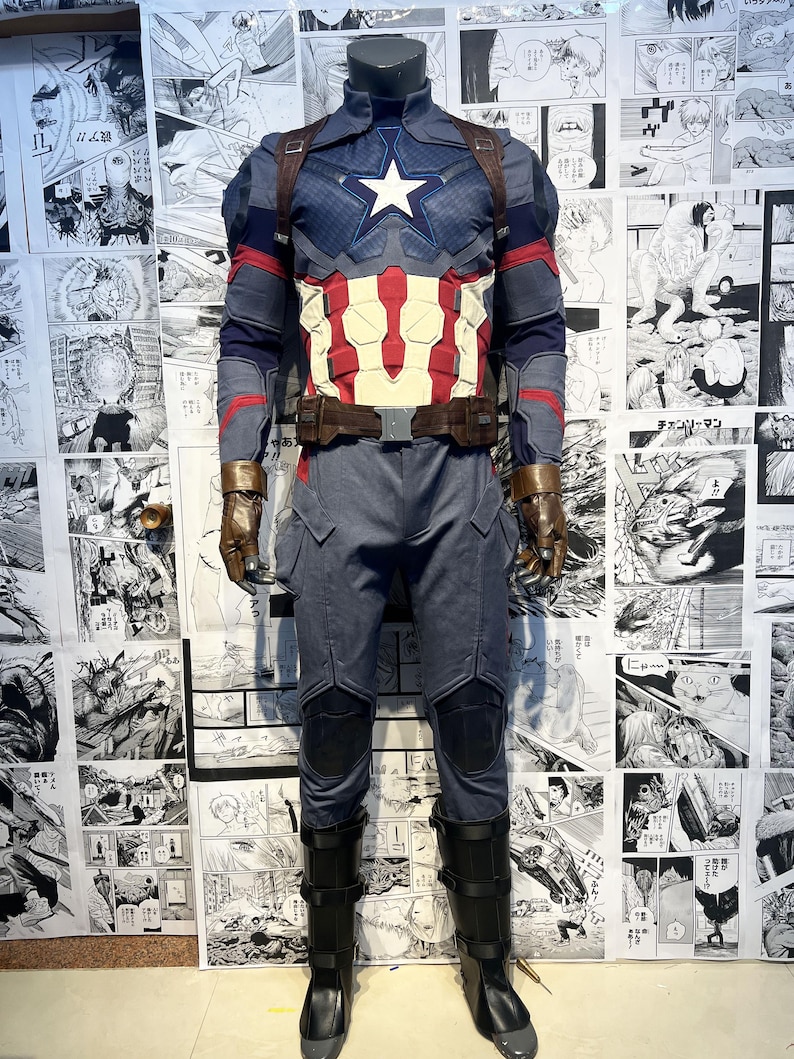 May include: A blue and red superhero costume with a star on the chest and a brown belt. The costume includes a long-sleeved jacket, pants, and boots.
