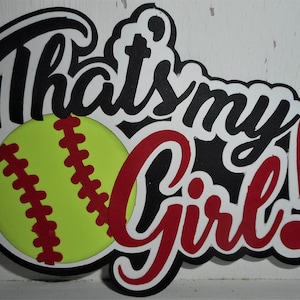 May include: A softball-themed design with the text "That's my Girl!" in a playful script. The design features a yellow softball with red stitching, set against a black and white background. The red text adds a bold contrast to the design.
