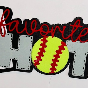 May include: A black and gray photo frame with the word "favorite" in red cursive lettering and the word "photo" in gray with a black outline. The letters in "photo" have a stitched look. There are two yellow softball-shaped cutouts with red stitching.