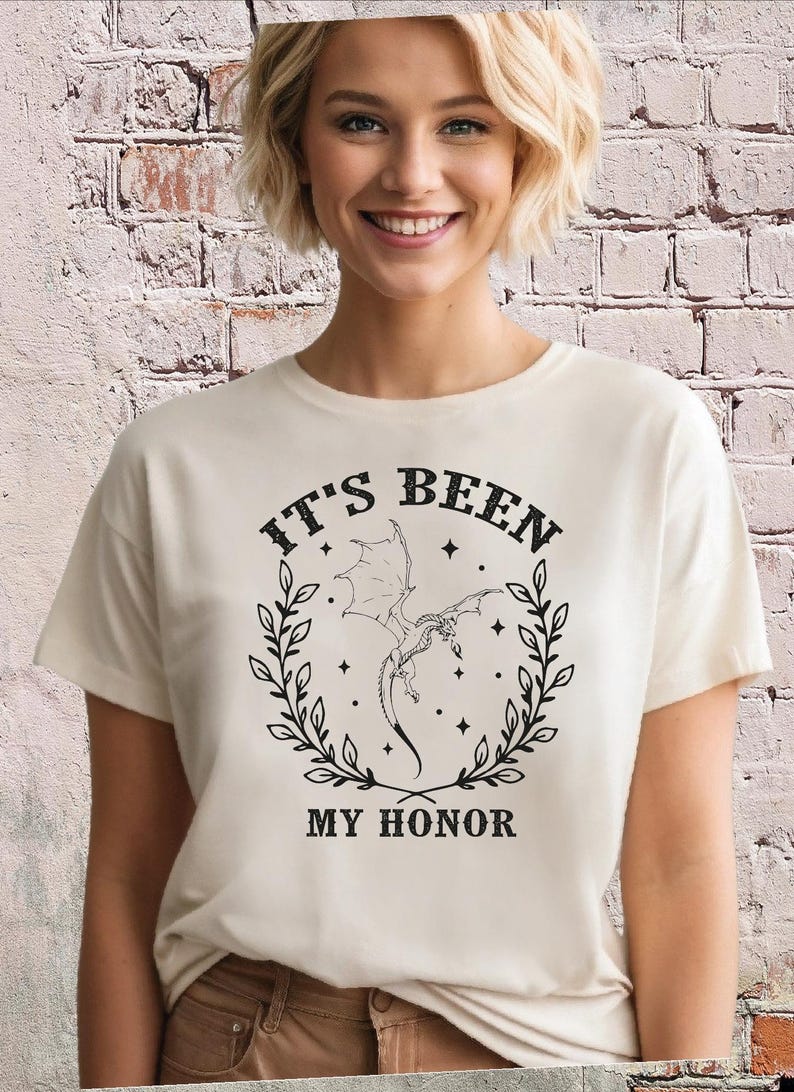a woman wearing a t - shirt that says it's been my honor