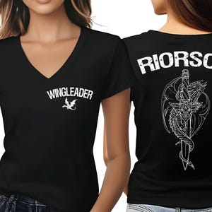 A woman wearing a black t-shirt with the text "WINGLEADER" printed on it, along with a graphic of a dragon.