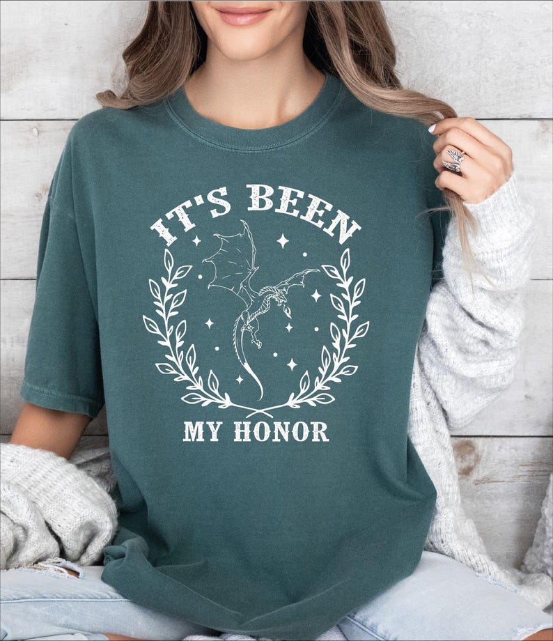 a woman wearing a t - shirt that says it's been my honor