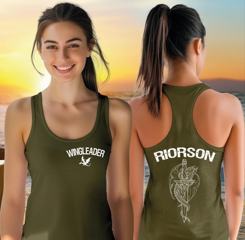 A woman wearing a green tank top with the text "WINGLEADER" printed on it, smiling at the camera.