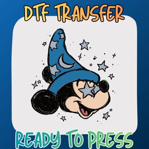 May include: A DTF transfer graphic featuring a cartoon mouse wearing a blue wizard hat with stars and a crescent moon. The mouse has star-shaped glasses and is surrounded by small stars. The text reads DTF TRANSFER at the top and READY TO PRESS at the bottom.