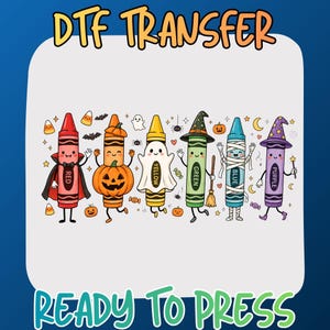 May include: A DTF TRANSFER READY TO PRESS graphic featuring six anthropomorphic crayons dressed in Halloween costumes: a red vampire, an orange pumpkin, a yellow ghost, a green witch, a blue mummy, and a purple wizard, with candy and bats.