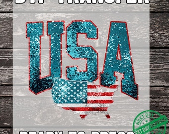 May include: DTF TRANSFER graphic with the word "USA" in teal sequins and a map of the United States with a flag design. The words "READY TO PRESS" are below the graphic. A green circle with "NEXT DAY SHIPPING" is in the bottom right corner.