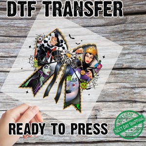 May include: DTF transfer featuring Disney Villains. The design includes Cruella de Vil, the Evil Queen, Ursula, and Maleficent, arranged in a bow shape. The text "DTF TRANSFER" and "READY TO PRESS" are displayed in bold, black font.