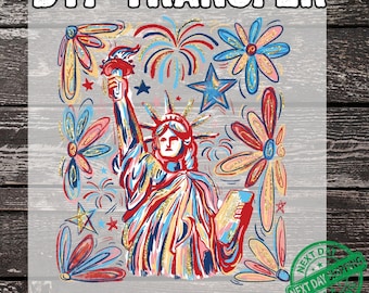 May include: DTF TRANSFER graphic featuring the Statue of Liberty with red, white, and blue accents, surrounded by fireworks, stars, and flowers. The text "READY TO PRESS" is displayed below the image.