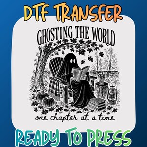 May include: A DTF transfer featuring a black and white illustration of a ghost sitting in a wooden chair reading a book under a tree. The text reads DTF TRANSFER, GHOSTING THE WORLD, one chapter at a time, and READY TO PRESS. Pumpkins, books, and a lantern are visible.