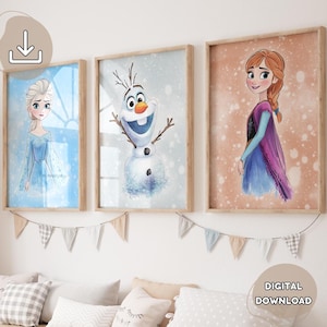 May include: Three digital printable wall art prints featuring characters from the movie Frozen. The prints are in wooden frames and feature a light blue background with a white snowflake pattern. The first print features Elsa, the second print features Olaf, and the third print features Anna.