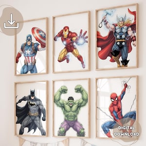 May include: Six framed superhero art prints featuring Captain America, Iron Man, Thor, Batman, Hulk, and Spider-Man. Each character is depicted in a dynamic pose with vibrant colours and detailed illustrations. The prints are displayed on a white wall.