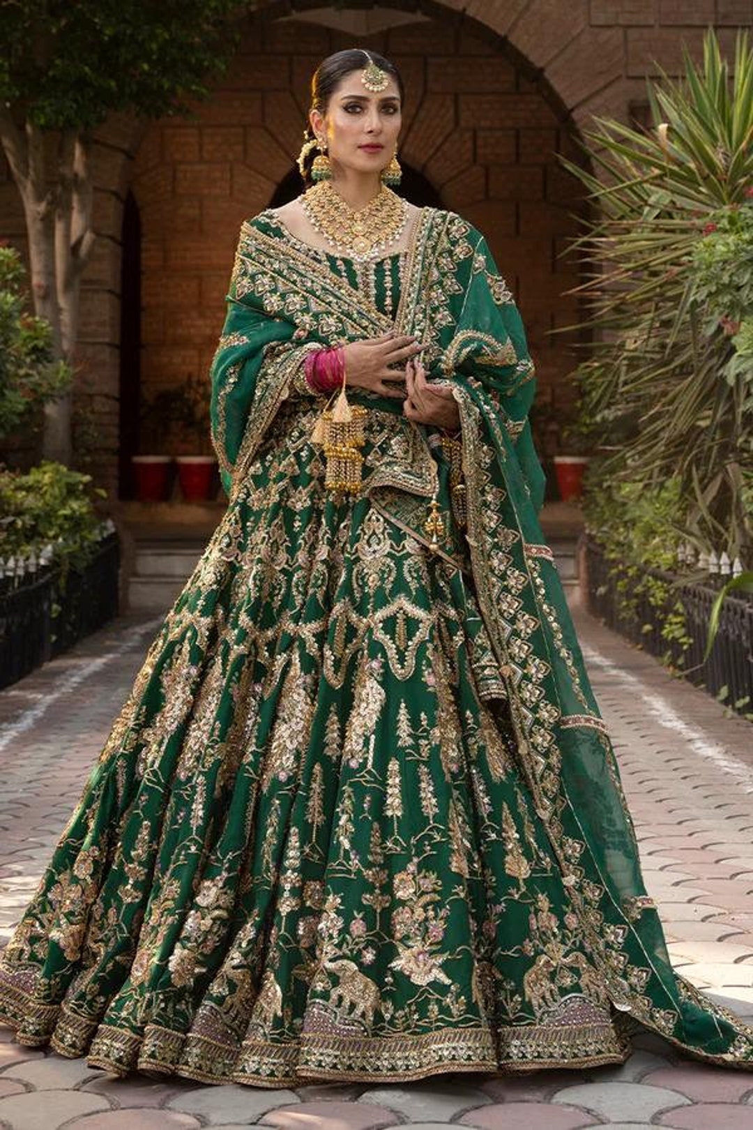 green emerald velvet dress Pakistani Sea Green Bridal Lehenga Dress Online for Bride – BridalLehenga main image 0