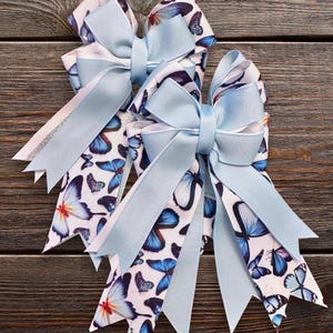 Light Blue Butterfly Horse Show Bows: Glitter Equestrian Accessories