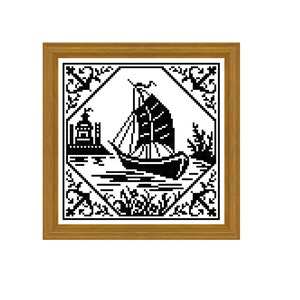 May include: Black and white cross-stitch design of a sailboat with a building in the background, framed in a wooden frame.