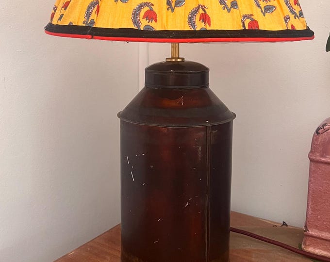Red 19th Century toleware lamp with traditional brass fittings. Collectible and unique.