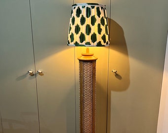 Vintage 1970s woven rattan floor-standing lamp, paired with a handmade blockprinted silk ikat lampshade.