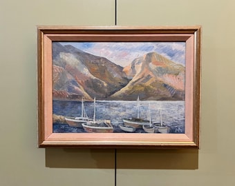A charming coastal themed oil painting on canvas, framed and signed by the artist