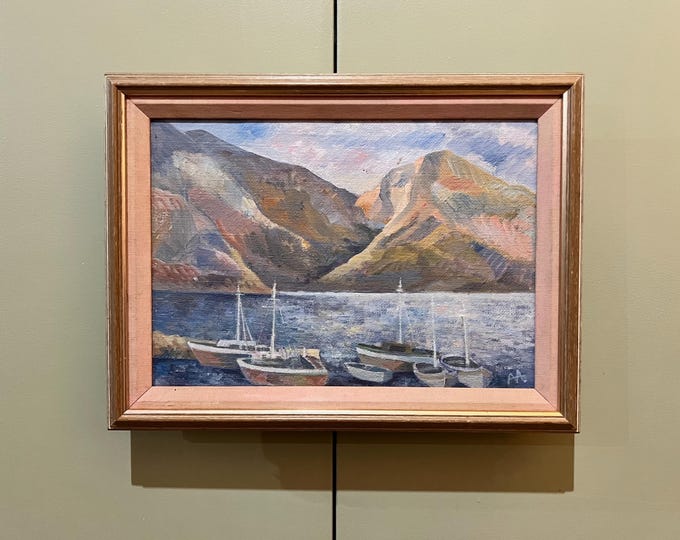 A charming coastal themed oil painting on canvas, framed and signed by the artist