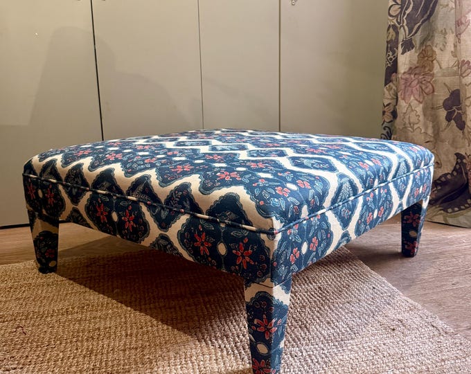 Bespoke footstool ottoman with fully upholstered legs in COM