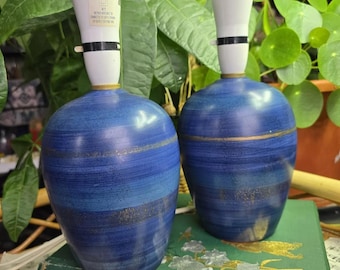 A pair of hand painted electric blue vintage pottery lamps, circa 1990’s