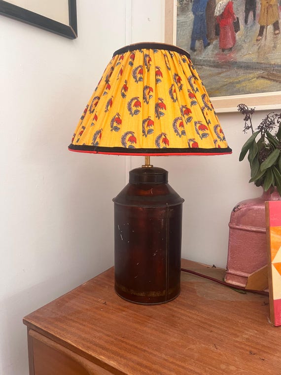 Red 19th Century toleware lamp with traditional brass fittings. Collectible and unique.
