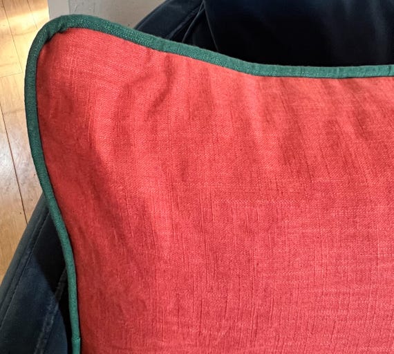Handmade 100% pure linen cushions with piping and available own a variety of colours