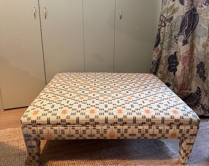 Bespoke footstool ottoman with fully upholstered legs in COM