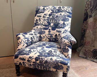 Sillón antiguo estilo Napoleón III tapizado a medida con la tela que usted elija o con una de las que le proporcionemos.